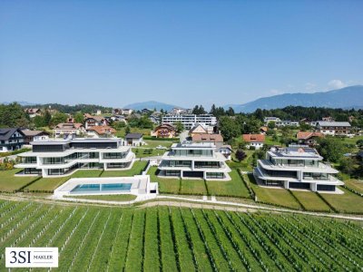 Luxus am Faaker See: Wohnen mit Privatstrand, Pool, Garten und großzügiger Dachterrasse