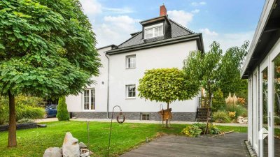 Modernisierte DHH mit Gartenparadies, Carport und Garage – Ihr neues Zuhause mit Ausbaureserve