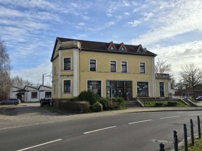 Mehrfamilienhaus mit Ladeneinheit