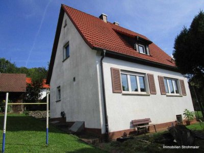 Einfamilienhaus mit schönem Grundstück als Kapitalanlage