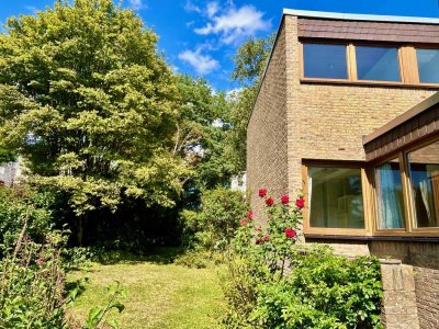 Funktionale Formen und klare Linien - zeitloses REH im Bauhausstil mit großem Garten wartet auf Sie!