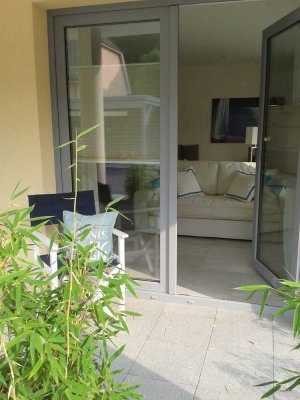 ERSTBEZUG - Modernes Studio-Apartment mit Einbauküche, Maßeinbauten und Terrasse