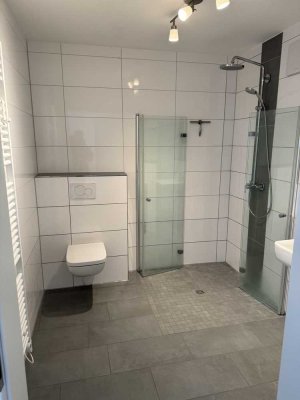 Neuwertige Wohnung mit einem Zimmer sowie Terasse und EBK in Rommerskirchen