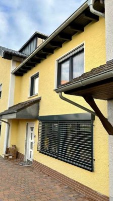 Schicke Maisonette-Wohnung mit Garten in zentraler Lage