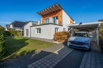 Einfamilienhaus auf sonnigem Grundstück in architektonischer Bauweise