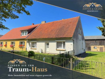 Handwerkertraum: Charmante Doppelhaushälfte mit großem Grundstück und Scheune!