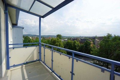 Dreiraumwohnung mit Blick über die Dächer der Stadt