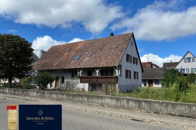 Sanierungsbedürftiges Doppelhaus mit Scheune & Garage auf großzügigem Grundstück