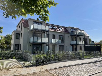 Erleben Sie den Charm Dachau-Süds! Einbauküche, Süd-Balkon und Tiefgaragenstellplatz.