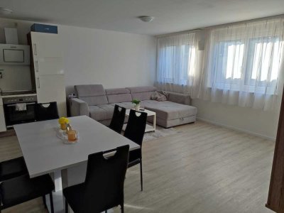 Exklusive 3,5-Zimmer-Souterrain-Wohnung in Karlsdorf-Neuthard