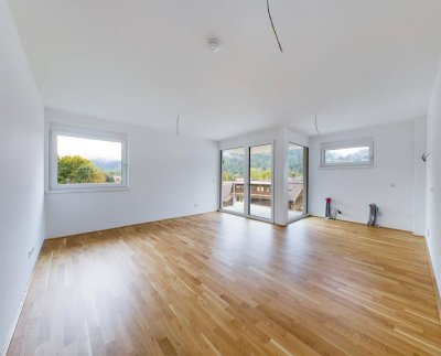 Neuwertige 2-Zimmerwohnung mit schönem Ausblick auf die Berge und hochwertiger Einbauküche inkl.. TG