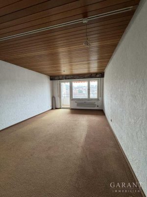 Renovierungsbedürftige 2 Zimmer-Wohnung mit Balkon und Tiefgarage