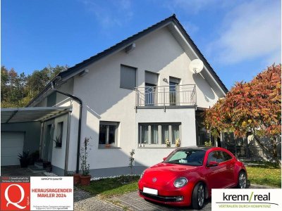 Hochwertiges Einfamilienhaus mit elegantem Wintergarten und gepflegtem Grund!