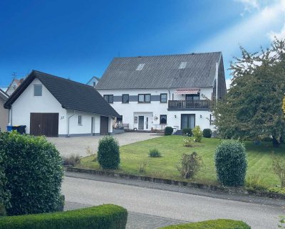 Zweifamilienhaus + Ferienhaus + Baugrundstück Investition mit Herz und Wachstumspotential