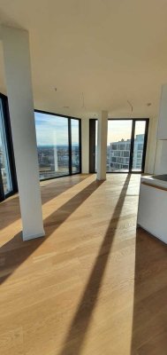 Luxuriöse Penthouse-Eckwohnung mit Alpen- und Stadtblick