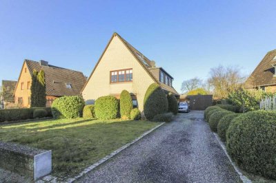 Charmante Erdgeschosswohnung  im Zweifamilienhaus mit Terrasse, Garten und Garage – in ruhiger Lage