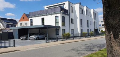 3 Zimmerwohnung mit Terrasse und Stellplatz, fast noch neu, mit viel Licht und Grün