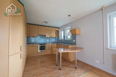 Helle Erdgeschosswohnung mit Gartenanteil und Terrasse in zentraler Lage