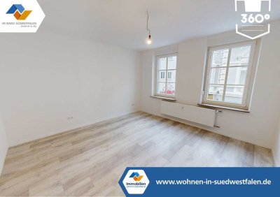 VR IMMO: Charmante Zwei-Zimmer-Wohnung mit Balkon im Herzen von Plettenberg.