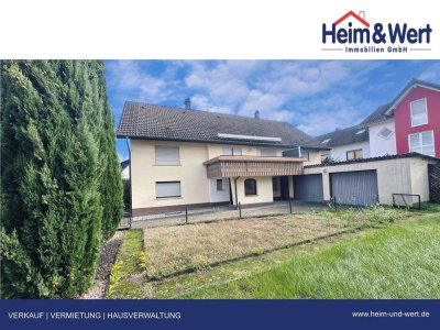 Freistehendes 2-Familienhaus mit großem Grundstück und viel Potenzial in Ötigheim