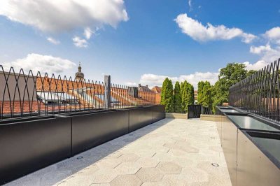 Über den Dächern: atemberaubende 4-Zimmer-Wohnung mit Balkon und 40 m² Rooftop