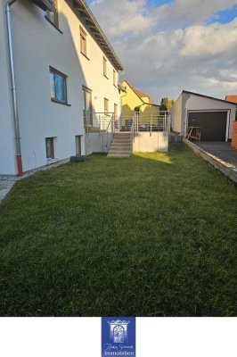 Besondere Familienwohnung über 4 Ebenen mit großer Terrasse und Garten im Erstbezug!