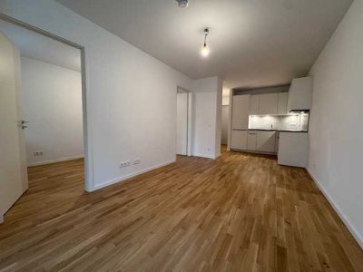 2-Zimmer im Neubau - Sonnen-Balkon & Einbauküche