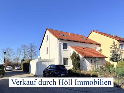 Höll Immobilien verkauft Doppelhaushälfte mit gepflegtem Garten und Garage in Halle/Dölau