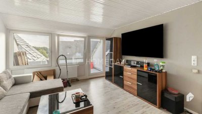 Frühstück in der Sonne! Helle Dachgeschosswohnung mit Süd-Balkon und 2 Zimmern