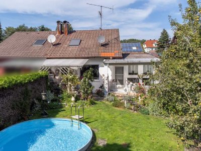 Familienfreundliches Zuhause mit Pool, Garage und großem Garten