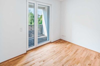 A+ Top Lage 3 Zimmerwohnung I.OG Aufzug KfW40 Kühlung gr. überdachter Balkon