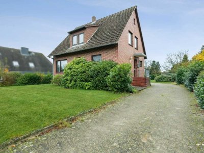 Geräumiges Zweifamilienhaus mit ca. 1.404 m² Traumgrundstück in Neuenkirchen-Delmsen