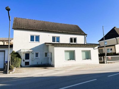 Einfamilienhaus mit Gewerbeeinheit in zentraler Lage