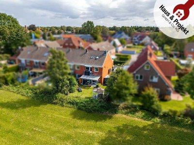 Attraktives Reihenendhaus in Aurich – Geräumiges Wohnen mit idyllischem Blick ins Grüne