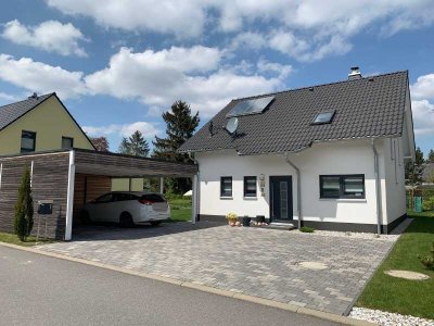 Individuell geplantes Familienhaus mit überdachter Terrasse & hochwertiger Ausstattung!