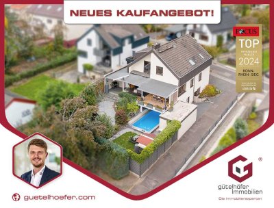 Stilvoll Wohnen und Relaxen! Modernisiertes Einfamilienhaus mit Einliegerwohnung, Pool und Koi-Teich