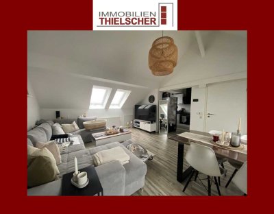 Moderne 2-Zimmer-Dachgeschosswohnung mit Stellplatz in zentraler Lage von Übach-Palenberg