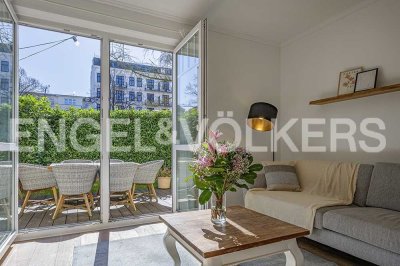 Moderne Ruheoase mitten in der Stadt: Eigentumswohnung mit eigenem Garten!