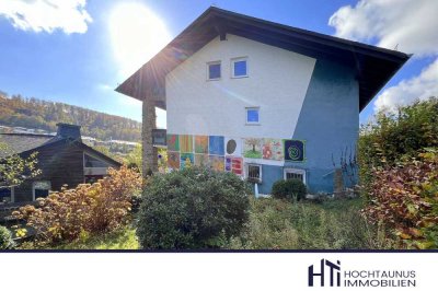 HTI |  XXL-Familienhaus mit großzügigem Garten in Taunuslage