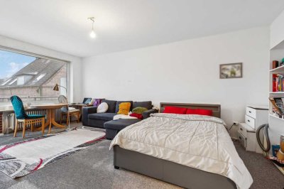 Tolle Kapitalanlage: vermietete 1-Zimmer-Wohnung mit Balkon, Einbauküche und Stellplatz vor der Tür