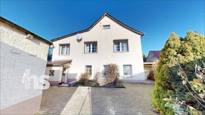 PROVISIONSFREI: Niveauvolles Einfamilienhaus mit Garten und Garage in familienfreundlicher Lage!