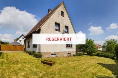 Reserviert Freistehendes Einfamilienhaus mit großem Garten