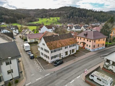 IMMORath.de - Mehrfamilienhaus mit Geschäftsräumen