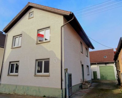 Einfamilienhaus mit Terrasse, zweistöckiger Scheune  und großem Garten in ruhiger Lage in Sandhausen