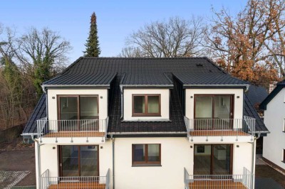 Haus im Haus! Beeindruckend schöne 4-Zimmer-Dachgeschosswohnung mit 2 Balkonen in exklusiver Seenähe