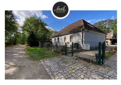 Wunderschönes Einfamilienhaus mit großem Garten & Bürogebäude in idyllischer Alleinlage am Wald