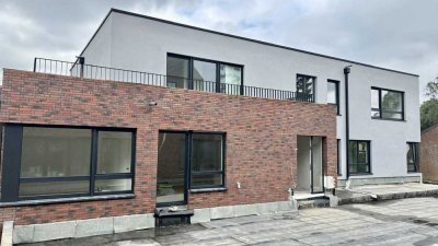 Neubau KR-Verberg: 3-Zi.-Garten-Wohnung mit gr. Terrasse, Aufzug, Wärmepumpe & KFW 55, Tiefgarage