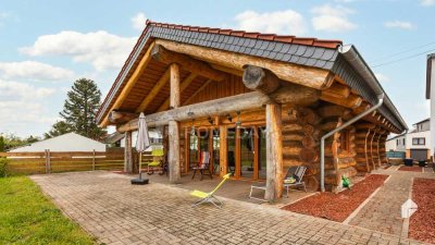 Ihr Traumhaus im Blockhausstil – Naturnahes Wohnen auf großzügigem Grundstück