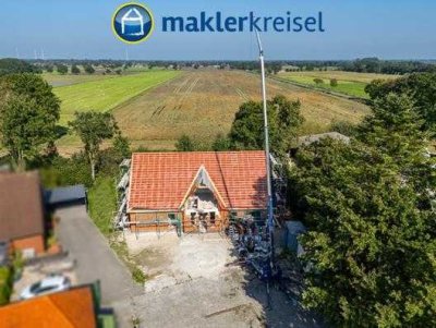 VORANKÜNDIGUNG! Ebenerdige Neubauwohnung mit Sonnenterrasse und Carport