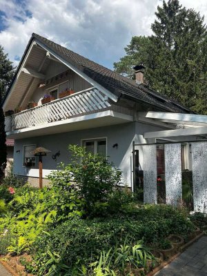 DEUTSCHMANNN IMMOBILIEN ***** ivd - Tolles Wohnhaus mit Einliegerwohnung in ruhiger Wald-Lage!